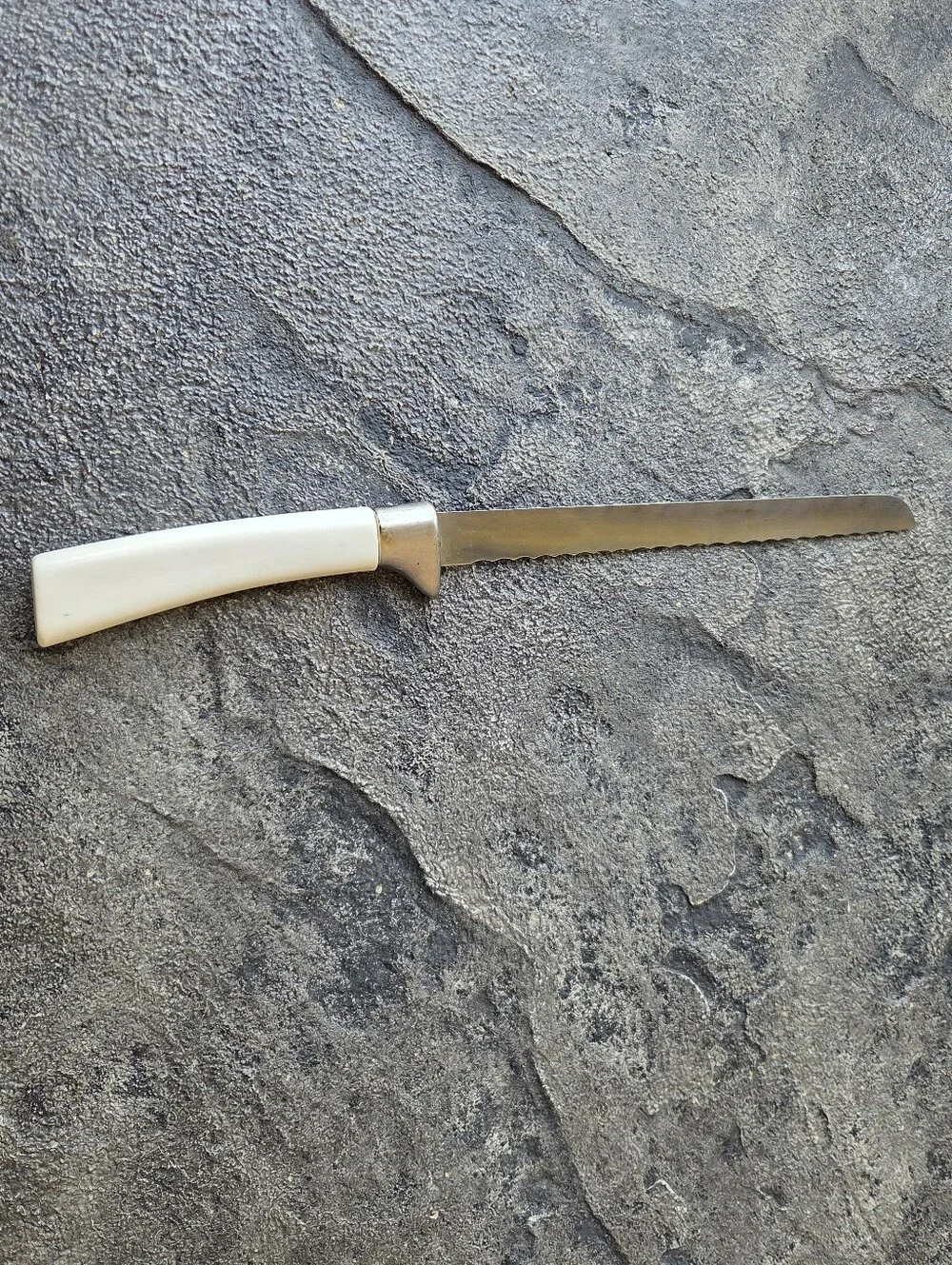 Cornflower Blue Lifetime Cutlery Serrated Table Knife with White Floral Handle